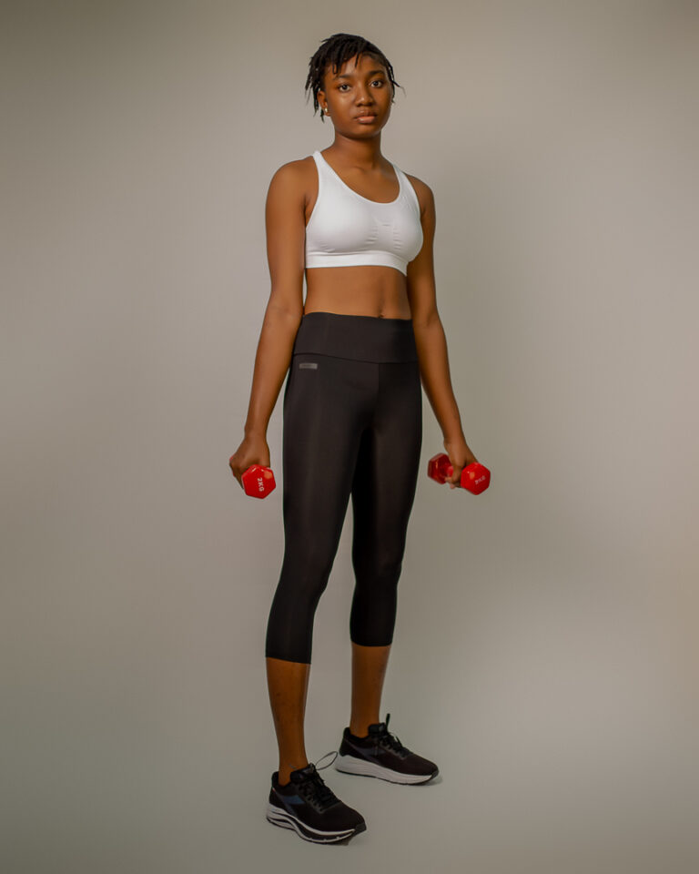 BLACK THREE QUATER SPORTS LEGGINGS AND WHITE BRAT TOP